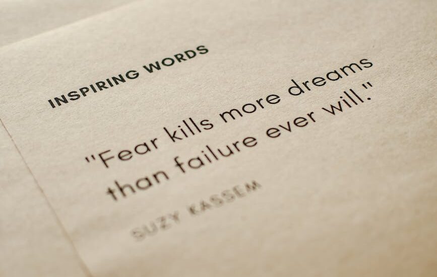 close up shot of inspiring words on a brown paper