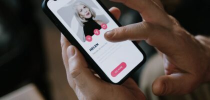 person looking at a contact in cellphone