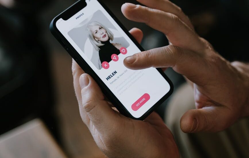 person looking at a contact in cellphone